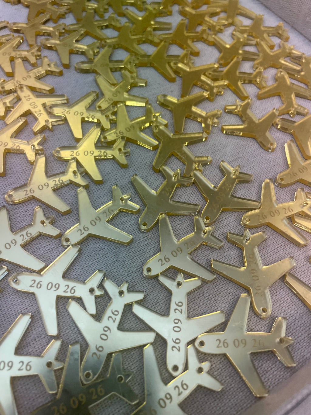 Gold airplane charms for weddings