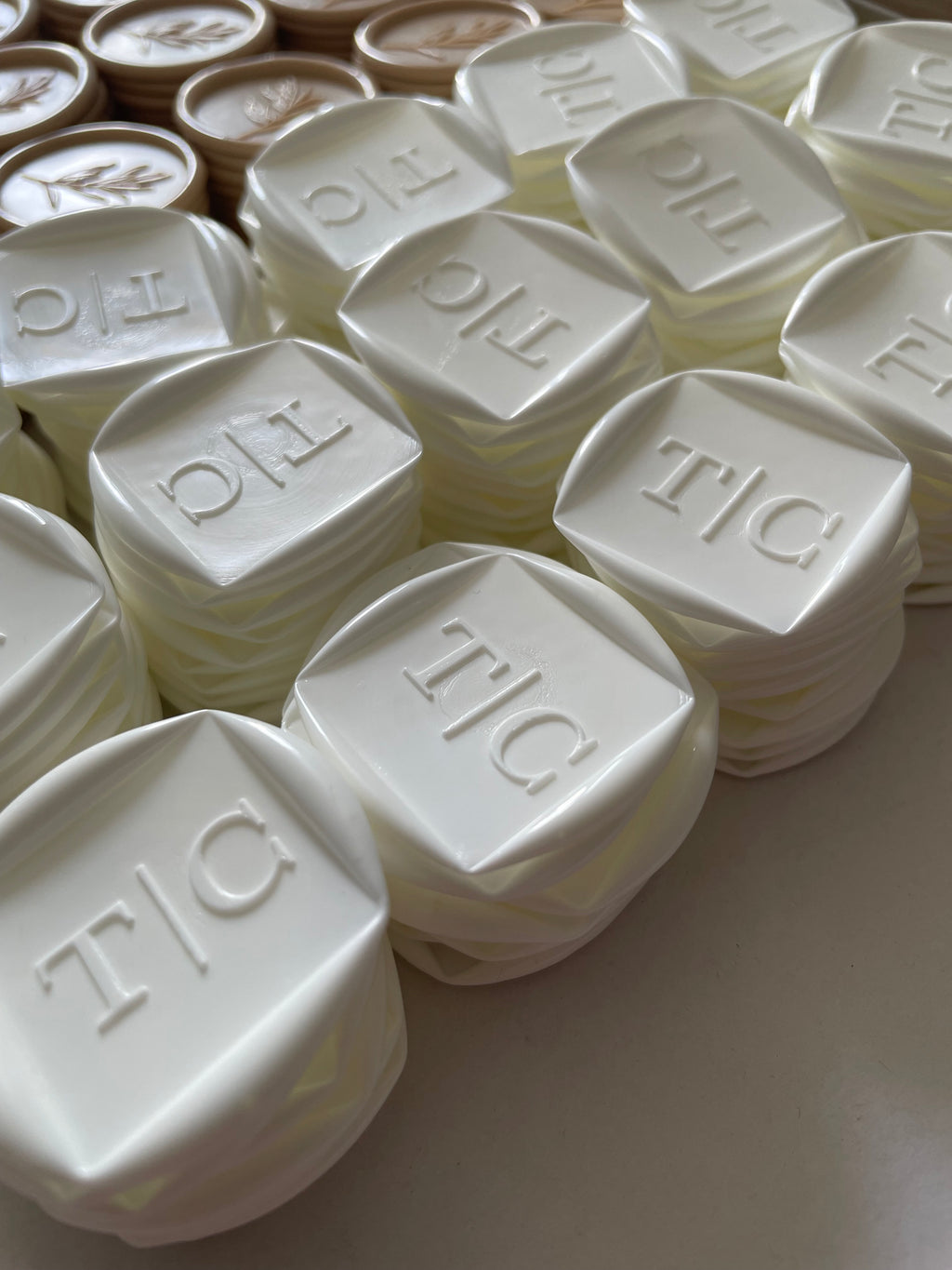 Collection of white embossed wax seals for wedding invitations and envelopes