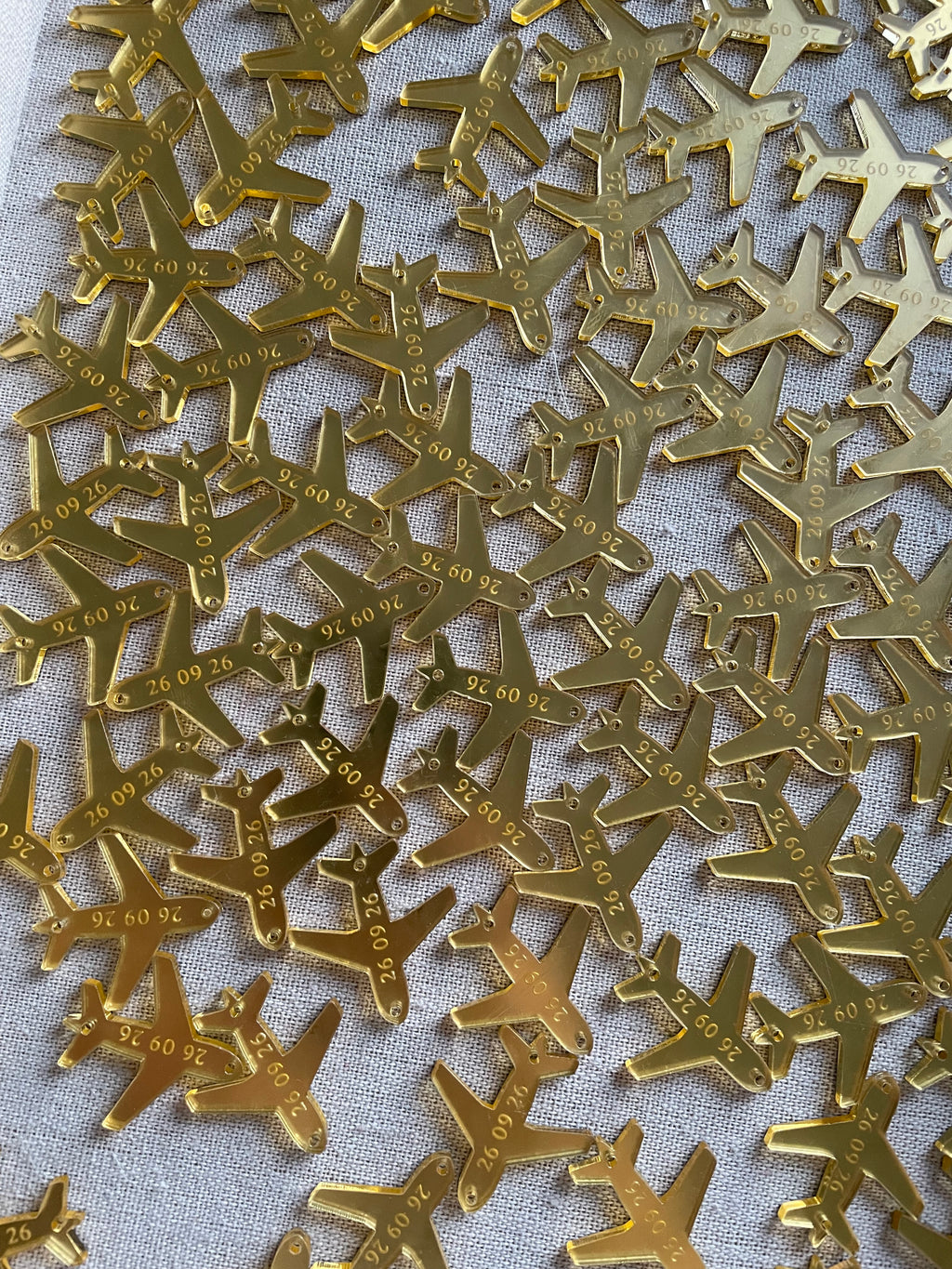 Gold airplane charms for weddings