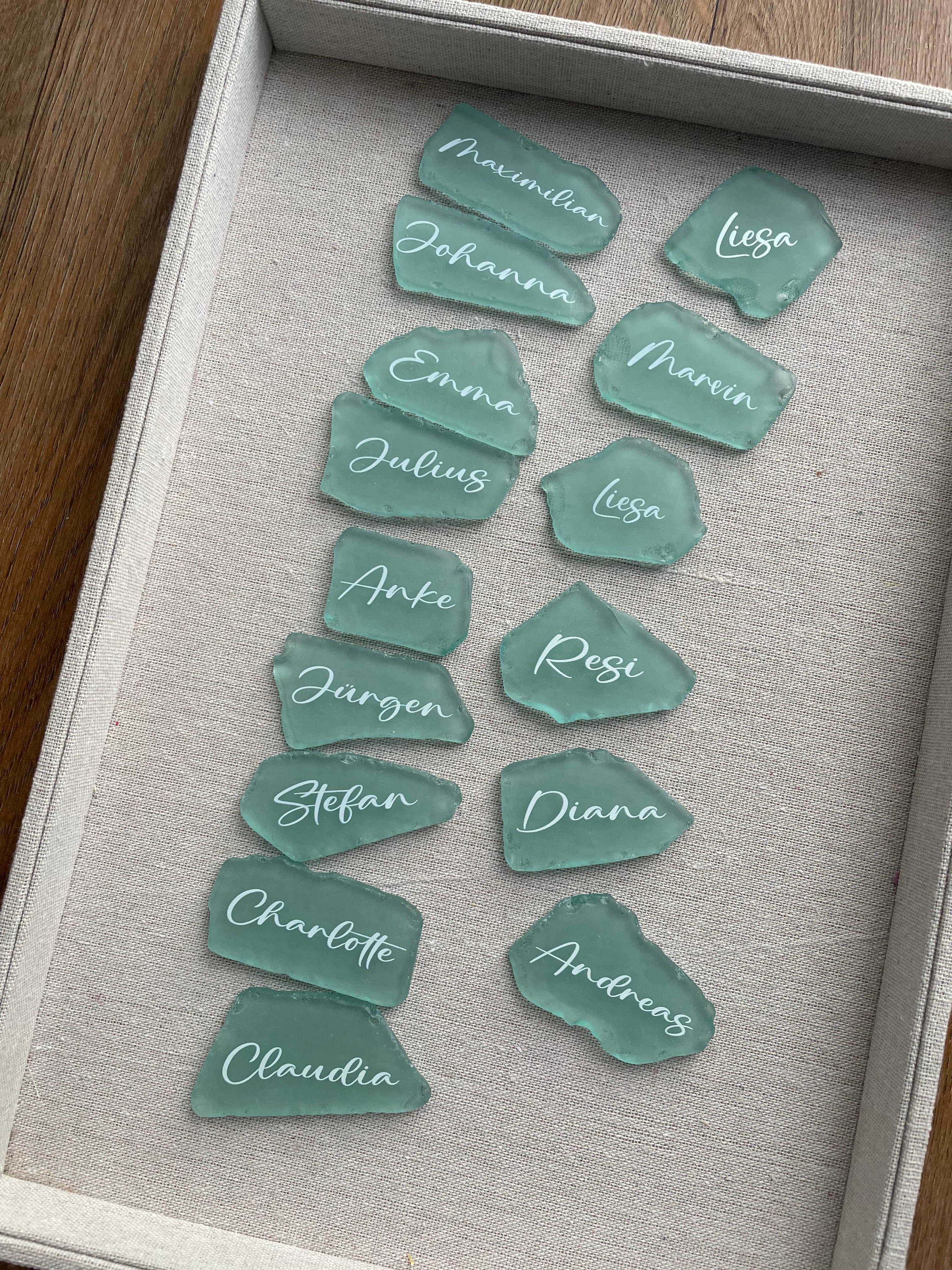 Sea glass wedding place cards with handwritten names