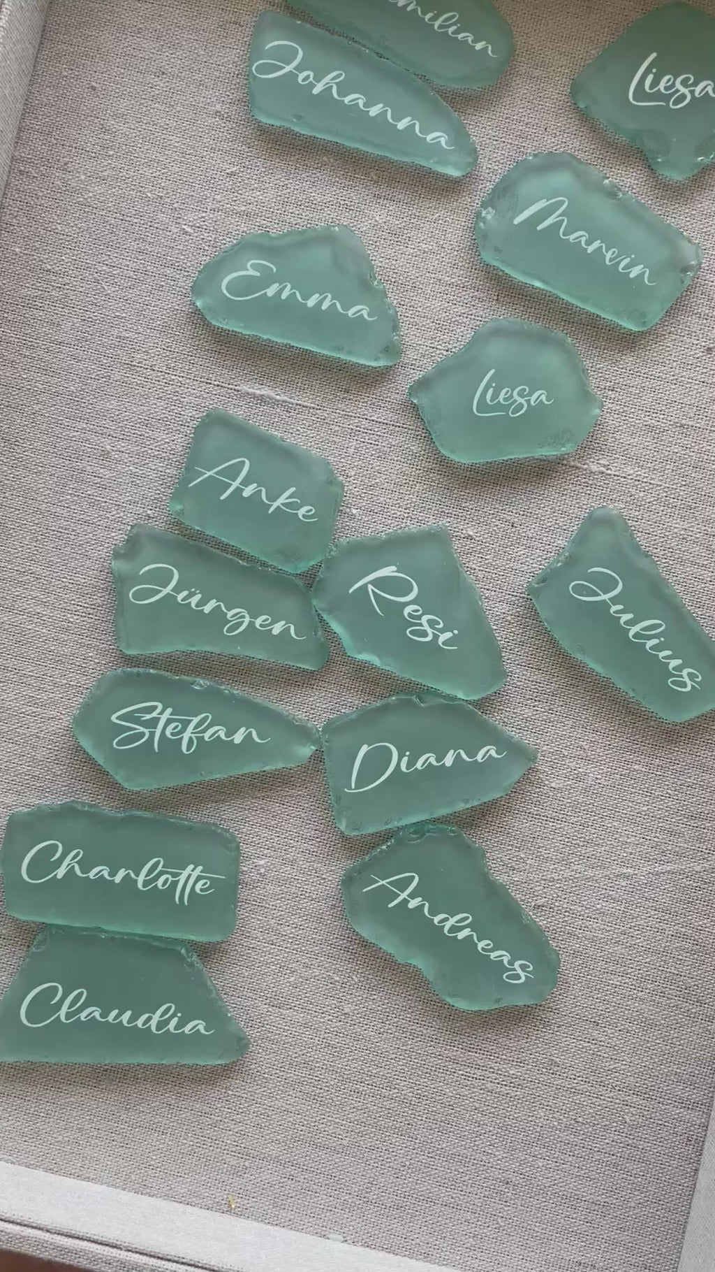 Sea glass wedding place cards with elegant calligraphy for table seating