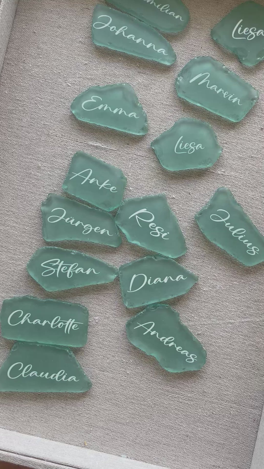 Sea glass wedding place cards with elegant calligraphy for table seating